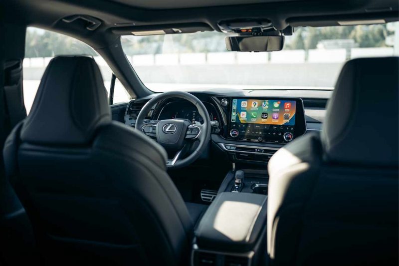 The interior of a Lexus vehicle, on a sunny day.