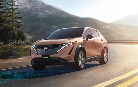 A Nissan Ariya Driving on the road